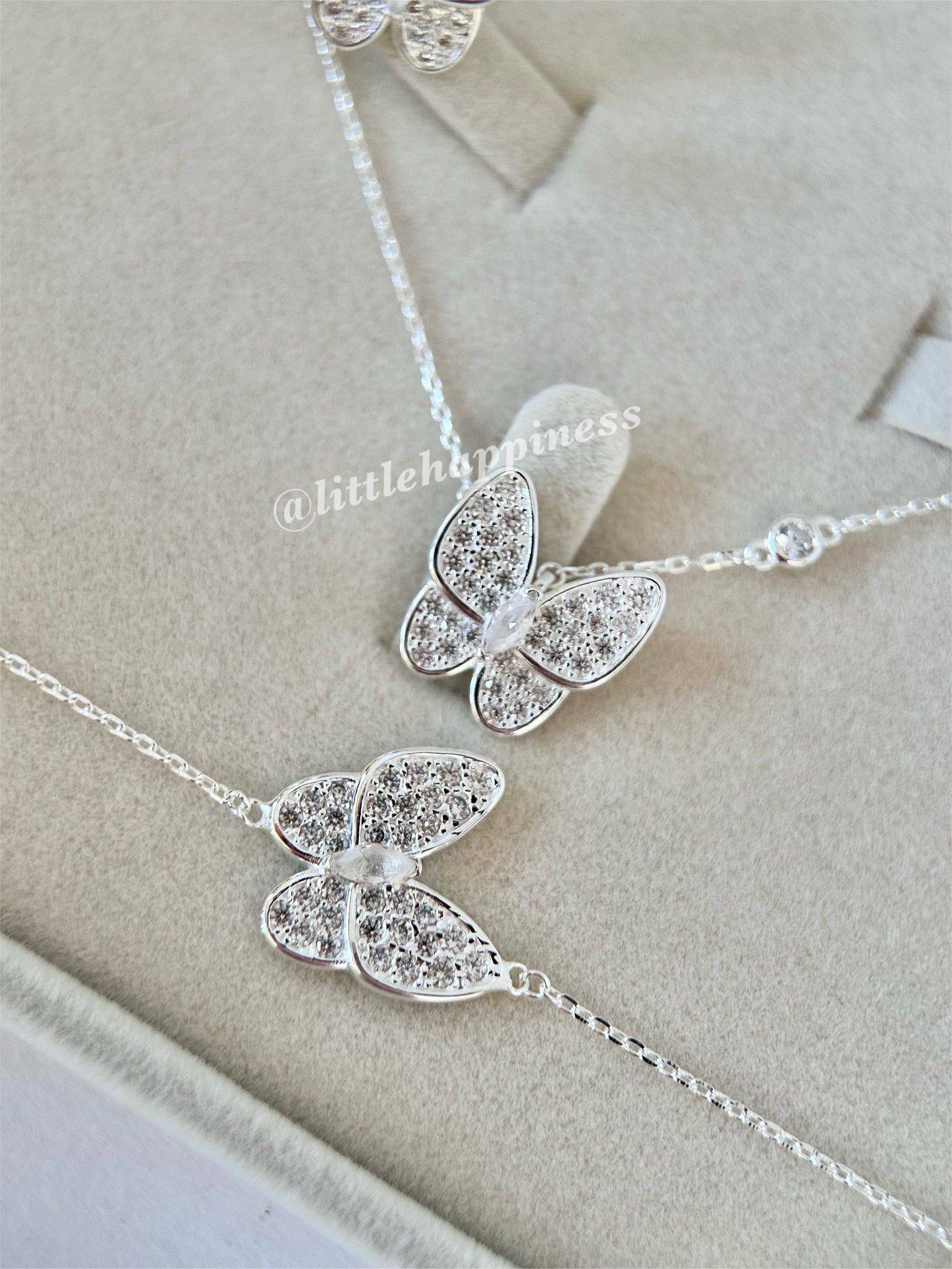 Conjunto Collar + aretes + pulsera Mariposa Van Cleef plateado