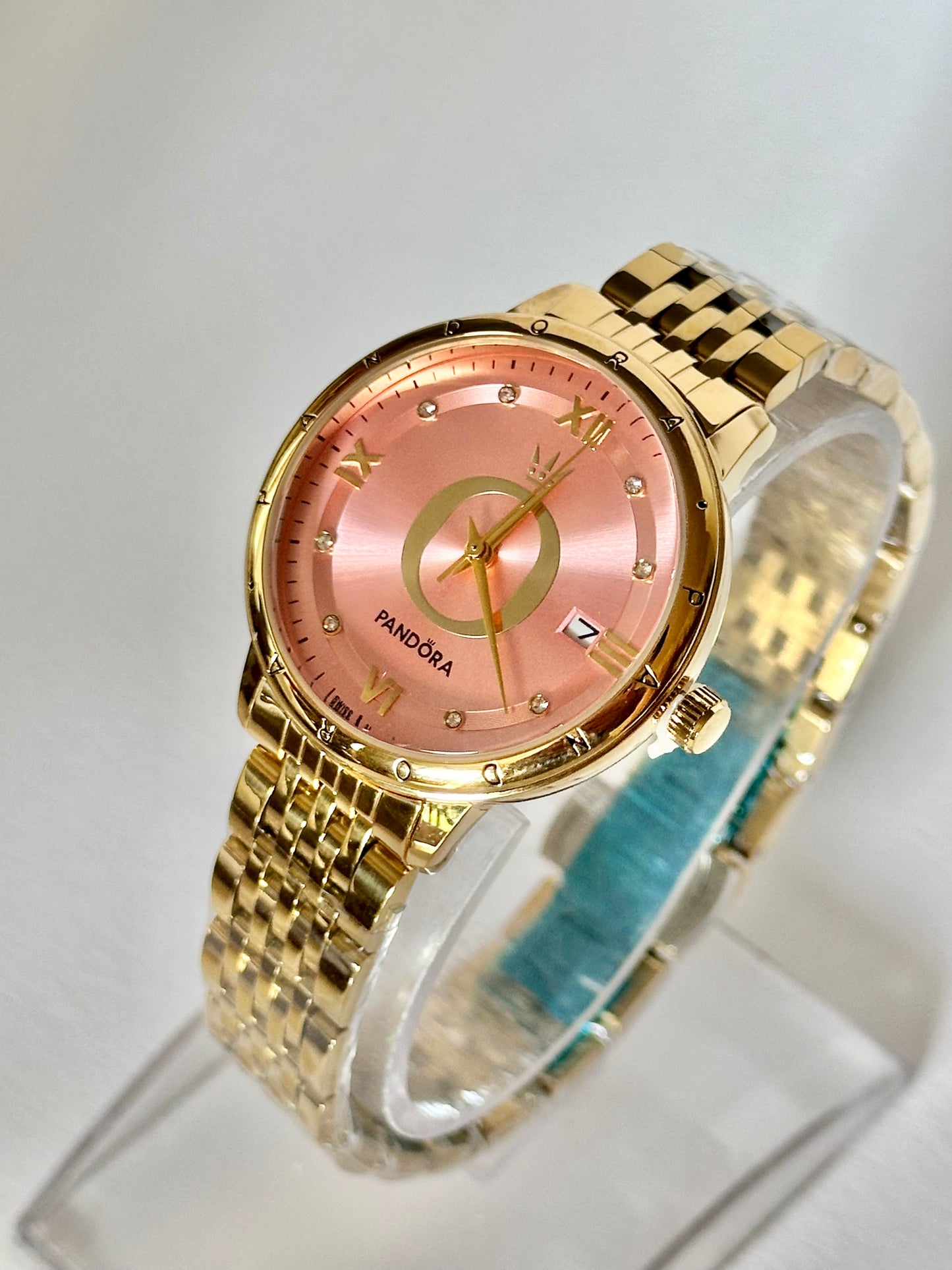 Reloj Pandora Dorado fondo Rosa