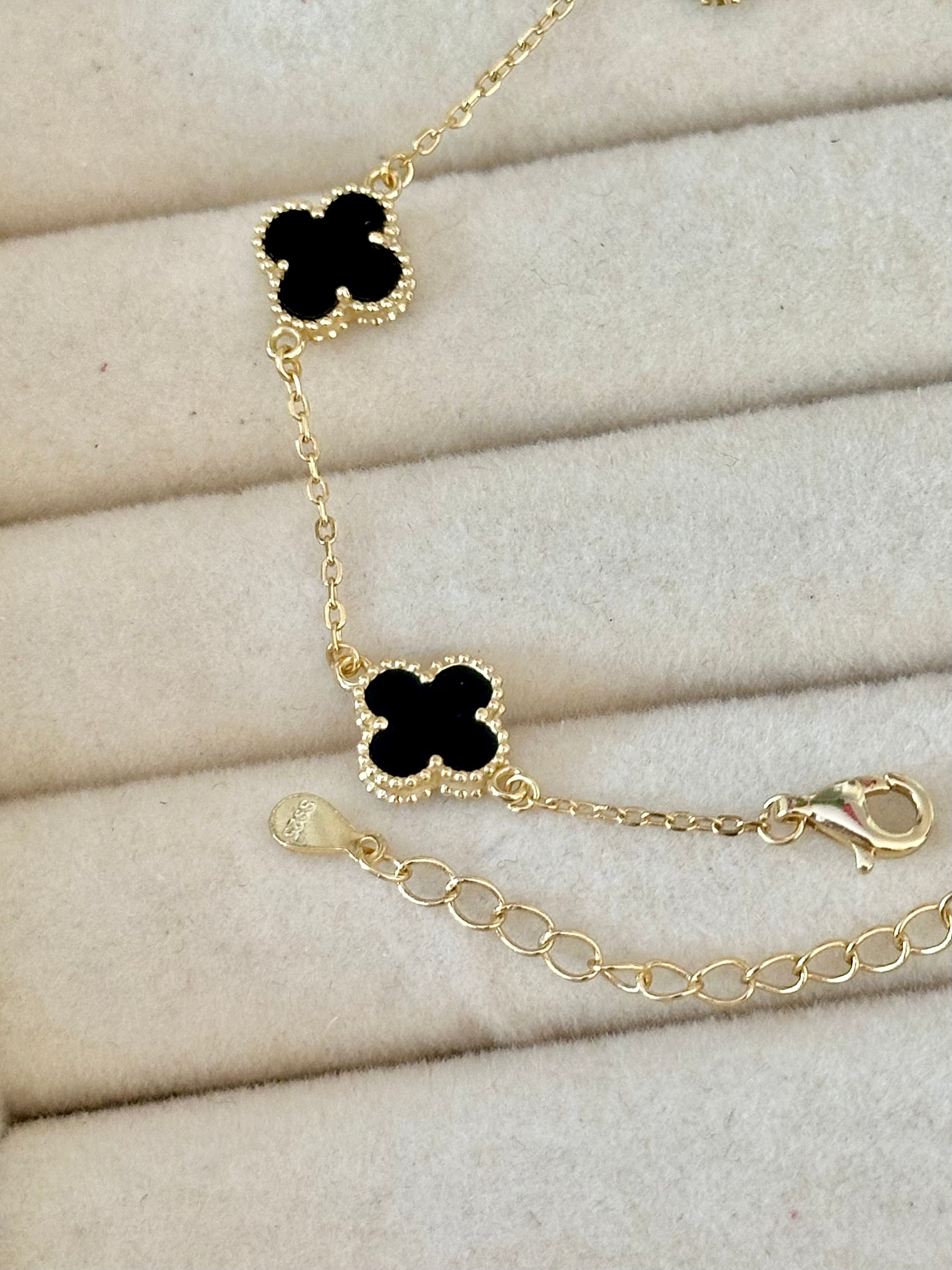 Pulsera Mini Tréboles Negro Con Baño de Oro